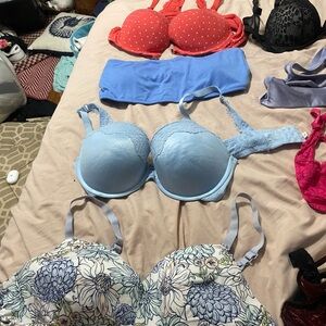 Assorted styles brands, sizes, and colors of women’s bras.